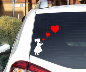 Girl Blowing Three Heart Stickers - Car Sticker