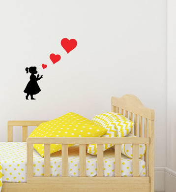 Girl Blowing Three Heart Stickers - Children's Wall Art